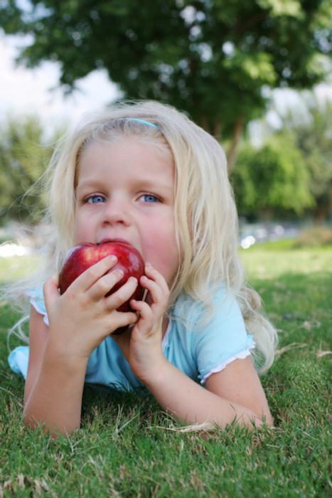 Child Eating Apple