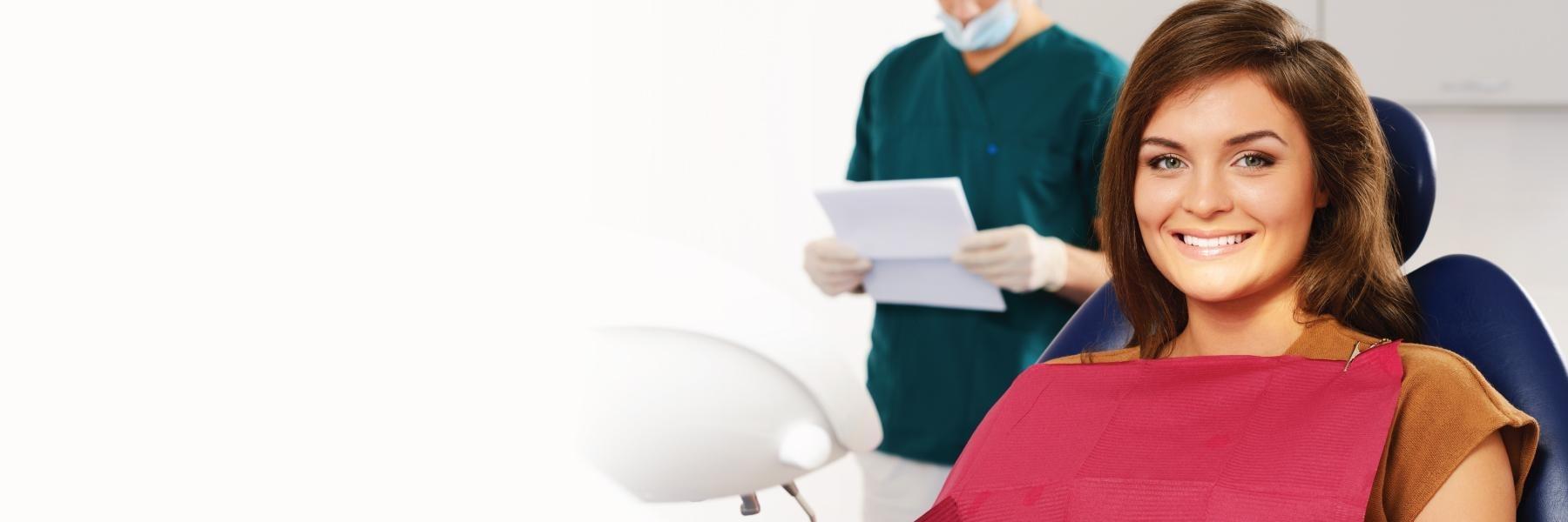 Woman sitting in dental chair