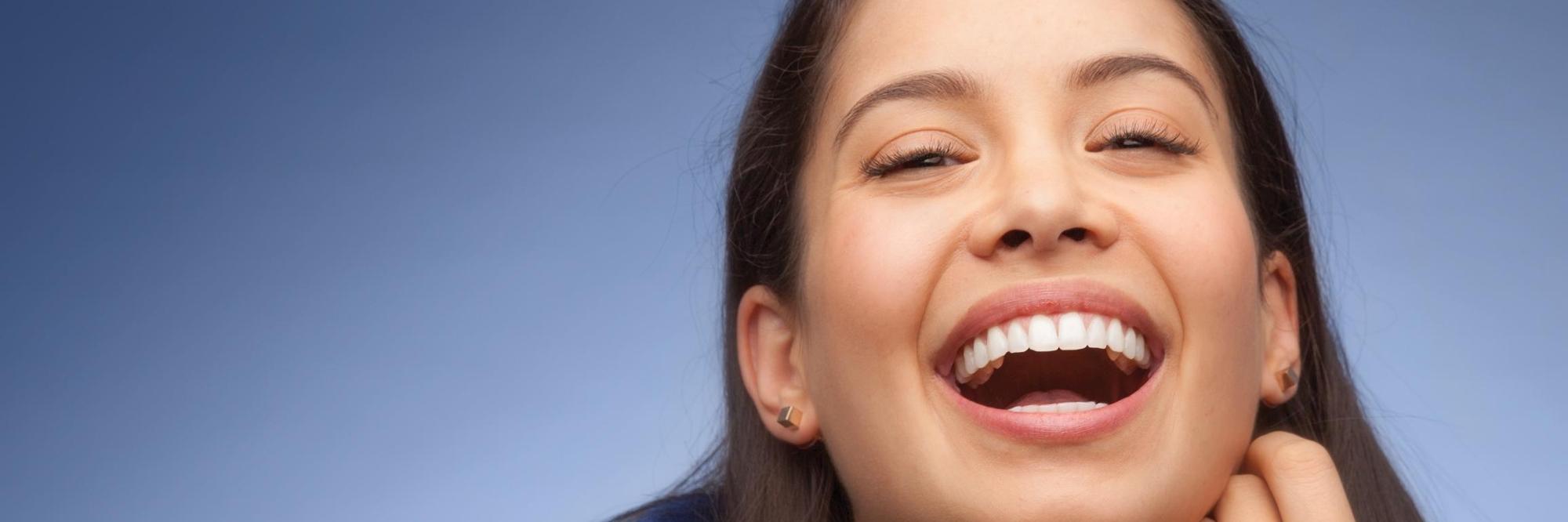 Girl Smiling after using Invisalign in Santa Monica CA