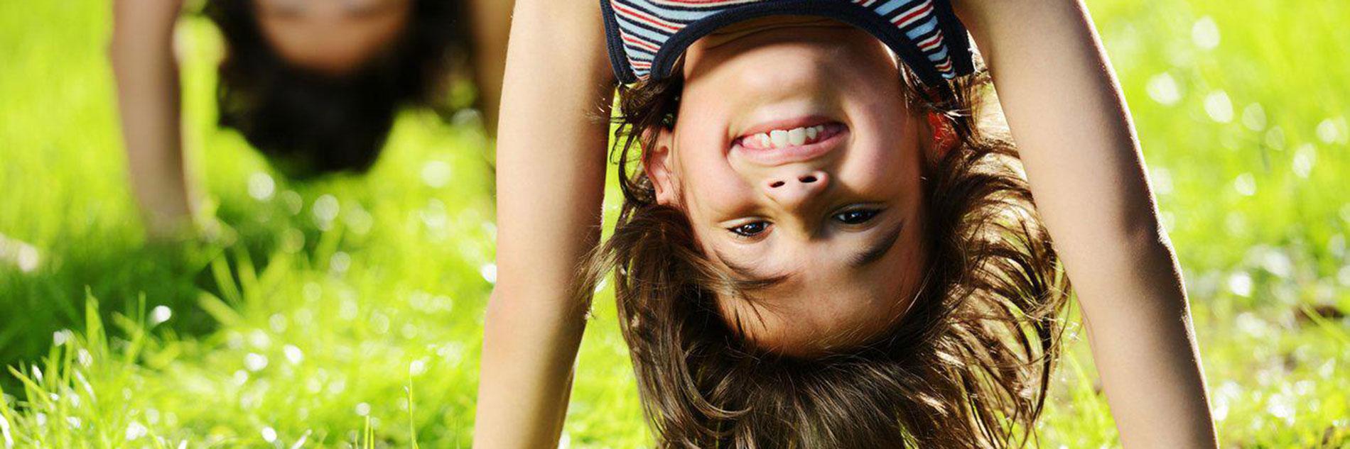 Child doing handstand | Pediatric Dentistry Santa Monica